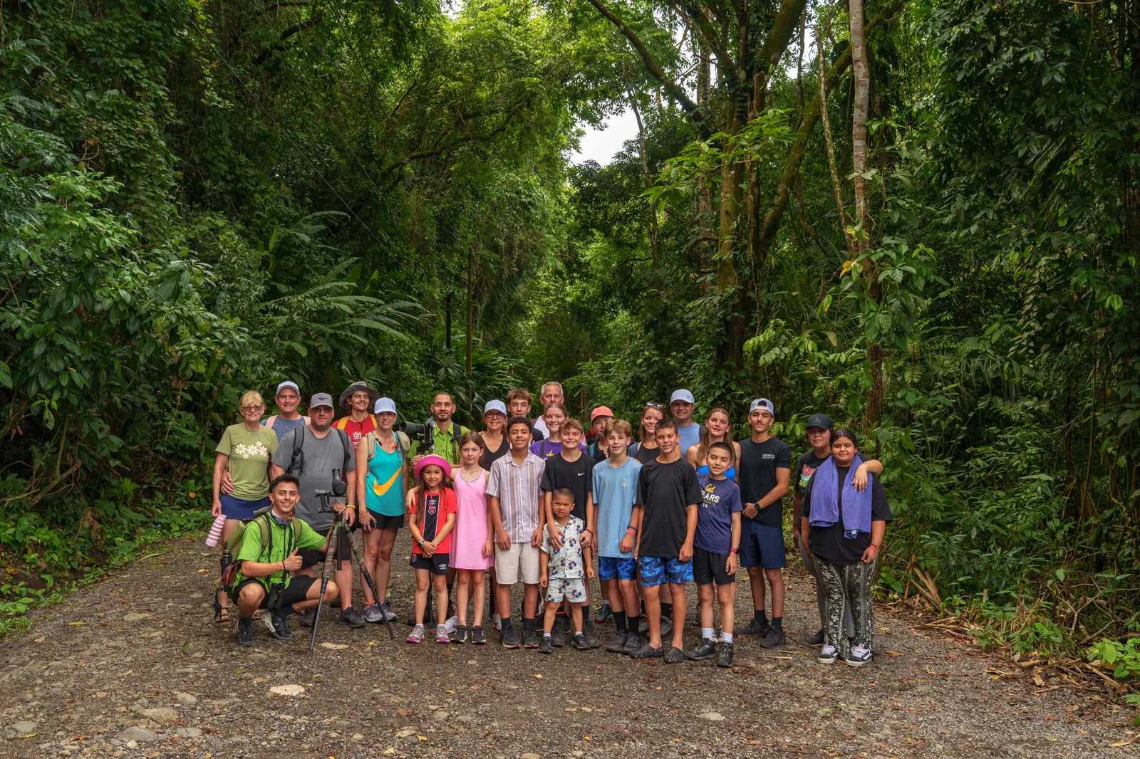 The full travelling group on a rainforest trail